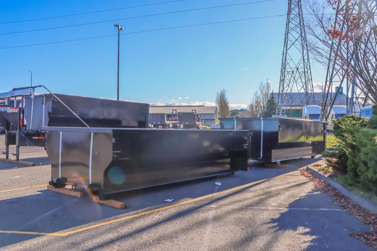 Roll-off dumpster ready for waste disposal at job site for Yard Waste Dumpster Rental in Summit